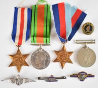 Four British WW2 medals comprising 1939/1945 Star, France & Germany Star, Defence Medal and War