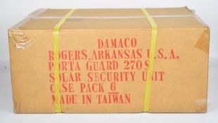 Six Daisy Porta-Guards solar charged alarms, all in original boxes.