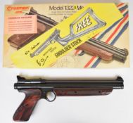 Crosman Model 1322 Medalist .22 target air pistol with shaped and chequered composite grip and