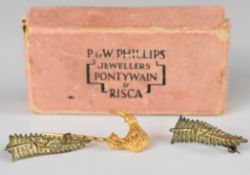 Two New Zealand 'fern' badges and Kiwi figural pin