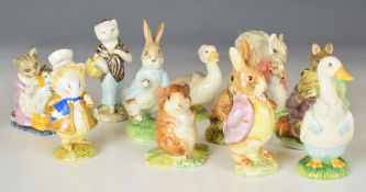 Twelve Beswick / Royal Albert Beatrix Potter figures including Susan and Amiable Guinea Pig
