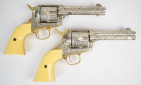 A pair of Franklin Mint John Wayne Western Commemorative .45 six shot single action revolvers,