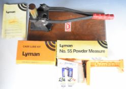 A collection of Lyman and similar cartridge re-loading tools and equipment including reloading