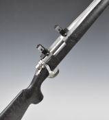 Remington Model 700 .22-250 Rem bolt-action rifle with composite stock, textured semi-pistol grip,