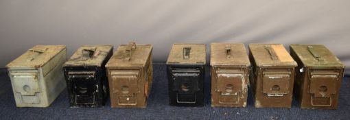 Seven military ammunition boxes, dated 1968, two 1969, and four 1986