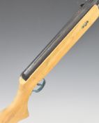 Westlake .22 air rifle with semi-pistol grip and adjustable sights, serial number 110428582.