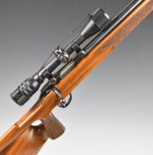 Sako L461 .223 bolt-action rifle with chequered thumb hole grip and forend, raised cheek piece,