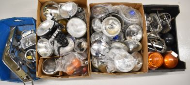 Large collection of headlamp, spot lamps and similar units including glass brake, side and indicator