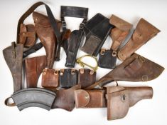Ten leather pistol holsters including one by Whitehouse & Hartley, Walsall dated 1914 and four