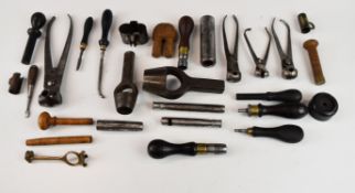 A collection of gun, shooting and re-loading tools and accessories including 8 and 10 bore wad