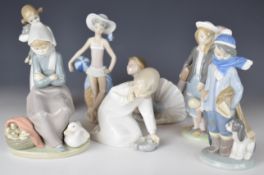 Eight Lladro child figures including girl with doll, ballerina, boy with puppy etc, tallest 22cm