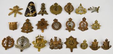 Twenty British Army Corps badges including Ordnance Corps, Education Corps, Royal Engineers,