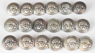 Eighteen buttons of Death's Head design stamped SS and 155 over 38 to reverse