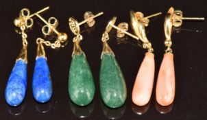 Two pairs of 14k gold earrings, one set with coral and the other lapis lazuli and a pair of 9ct gold