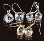 Two pairs of 9k white gold earrings set with kunzite and a pair of 9k gold earrings set with