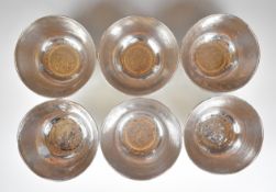Set of six Sudanese silver bowls, each with script decoration to insides and also marked to