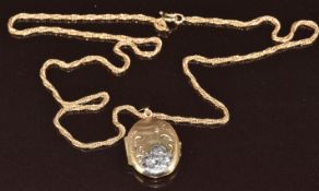 A 9ct gold bi-coloured locket on 9ct gold chain, 5.9g, 46cm