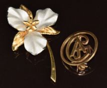 A 9ct gold bi-coloured brooch in the form of a flower (5.8g, 5cm) and another 9ct gold brooch (3.8g,