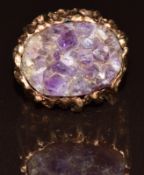 A 9ct gold ring set with a section of amethyst geode, London 1971, 8.8g, size H