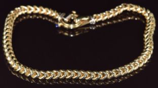 An 18ct gold curb link necklace by Signoretti, 72.8g, 42cm