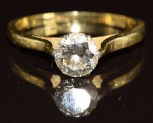 An 18ct gold ring set with a round cut diamond of approximately 0.7ct, 2.5g, size L