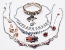 A collection of Art Deco jewellery including Empire bracelet, diamanté necklace, insect brooch,
