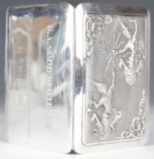 Thai silver cigarette case with embossed decoration of deities, marked Thye Yiak Sterling and with