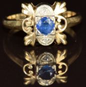 A 14k gold ring set with a round cut sapphire and diamonds, 3g, size L