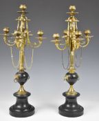 Pair of 19thC gilt and black marble candelabra, height 57cm