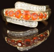 A 9k gold ring set with fire opals and diamonds, 2.8g, size N