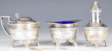 George V hallmarked silver condiment set comprising salt, mustard and pepper, the former two with