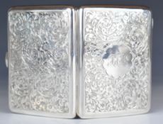 Edward VII hallmarked silver calling card case with engraved decoration, opening to reveal leather