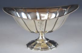 American silver pedestal bowl with beaded edge, marked Sterling and with prancing lion in letter J