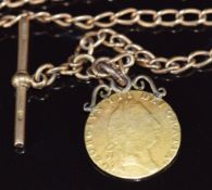 A 9ct gold Albert / watch chain made up of oval twisted links (17g) with a 1794 guinea fob with