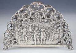 Late 19thC continental silver letter rack, each side with repoussé decoration depicting Rembrandt'