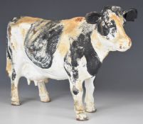 Cast iron figure of a Friesian cow, length 35 x height 22cm
