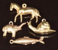 Four 9ct gold charms including horse, snail, elephant and fish, 3.7g