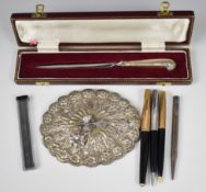 Middle Eastern or similar oval mirror with bird finial, maximum diameter 14cm, cased hallmarked