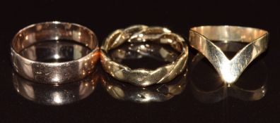 A 9ct rose gold wedding band / ring (2.2g, size N), a 9ct gold twist ring (2.5g, size J) and a 9ct