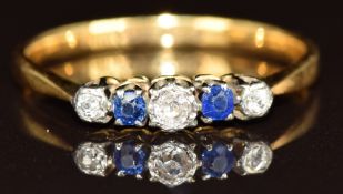 A 22ct gold ring set with old cut diamonds and sapphires, 2.7g, size T