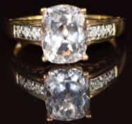 A 9k gold ring set with a morganite and diamonds, 3.6g, size Q