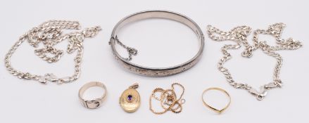 A 9ct gold locket set with an amethyst, 9ct gold V shaped ring set with a diamond, 9ct gold bracelet