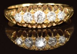An 18ct gold ring set with five old cut diamonds, Birmingham 1904, 3.7g, size O