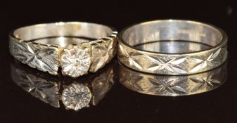 A 9ct white gold ring set with a diamond, with matching wedding band / ring, 5.6g, size N