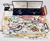 Costume jewellery including two necklaces, a pair of earrings and a brooch by Attwood & Sawyer,