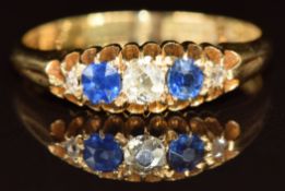 A c1915 18ct gold ring set with diamonds and sapphires, 2.7g, size P