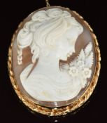 A 9ct gold brooch set with a cameo of a young woman, 22.3g, 6.5 x 5cm