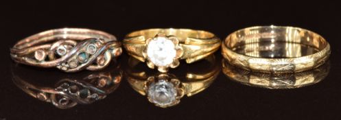 An 18ct gold ring set with a white sapphire (2.4g,size H), a 9ct gold wedding band / ring and a