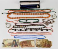 Fourteen beaded necklaces including lapis lazuli with silver heart pendant, three malachite one with