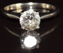 An 18ct white gold ring set with 1ct round cut diamond, with insurance valuation, 2.6g, size J